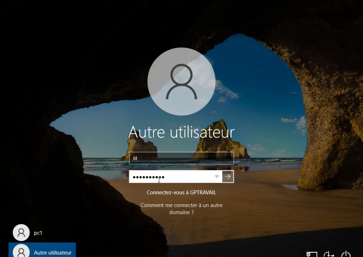 Windows 10 sign-in screen on a domain-joined client PC, showing a username field and prompt to sign in to the company domain