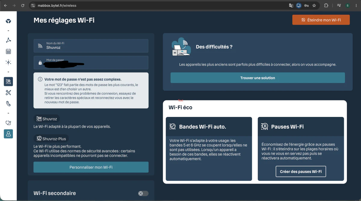 Router Wi-Fi settings page showing a weak-password warning and the secondary (guest) Wi-Fi option